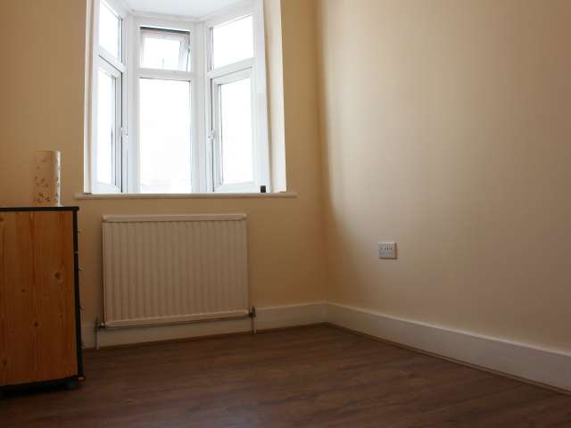 Decorated room in shared flat in Tottenham, London