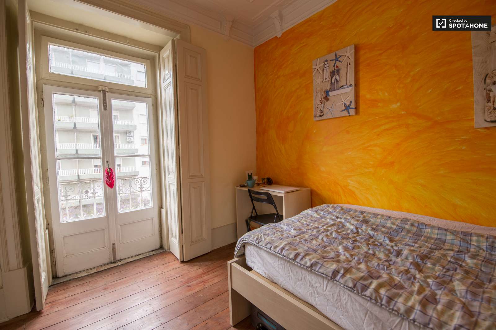 Room with sunny balcony